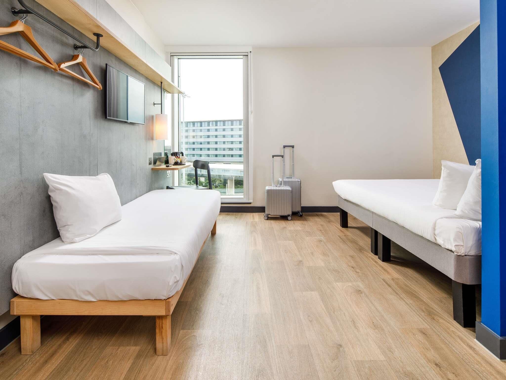 Hypo-allergenic bedding, memory-foam beds, desk, laptop workspace