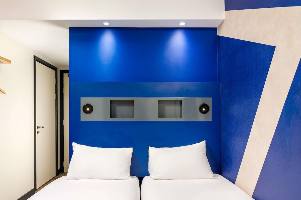 hypo-allergenic bedding, memory-foam beds, desk, laptop workspace