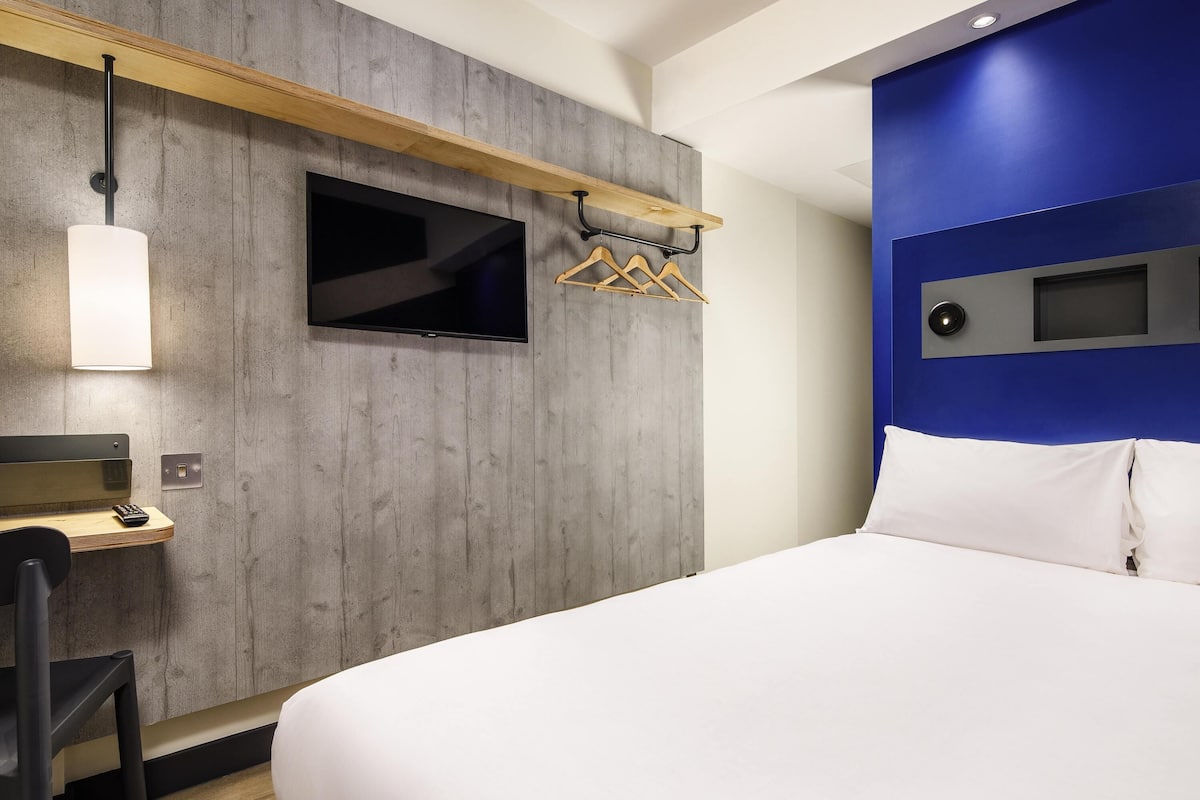 Hypo-allergenic bedding, memory-foam beds, desk, laptop workspace