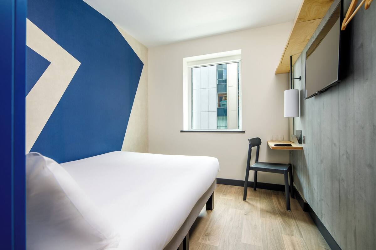 hypo-allergenic bedding, memory-foam beds, desk, laptop workspace