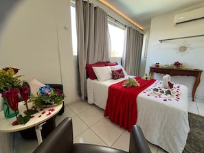 Suite com Vista Jardim