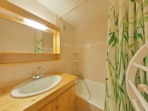 Bathtub, hair dryer