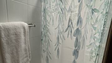 Shower, towels, soap, shampoo