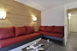 Cozy living space with a sofa and compact coffee table.