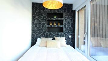 1 Schlafzimmer, BĂŒgeleisen/BĂŒgelbrett, kostenloses WLAN, BettwĂ€sche