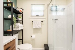 Shower, hair dryer, towels, soap