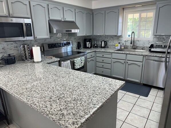 Fridge, microwave, oven, stovetop - Charming 3-Bedroom Farmhouse Retreat with Open Deck! (Acampo)