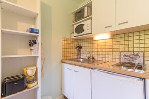 Fridge, microwave, coffee/tea maker, toaster