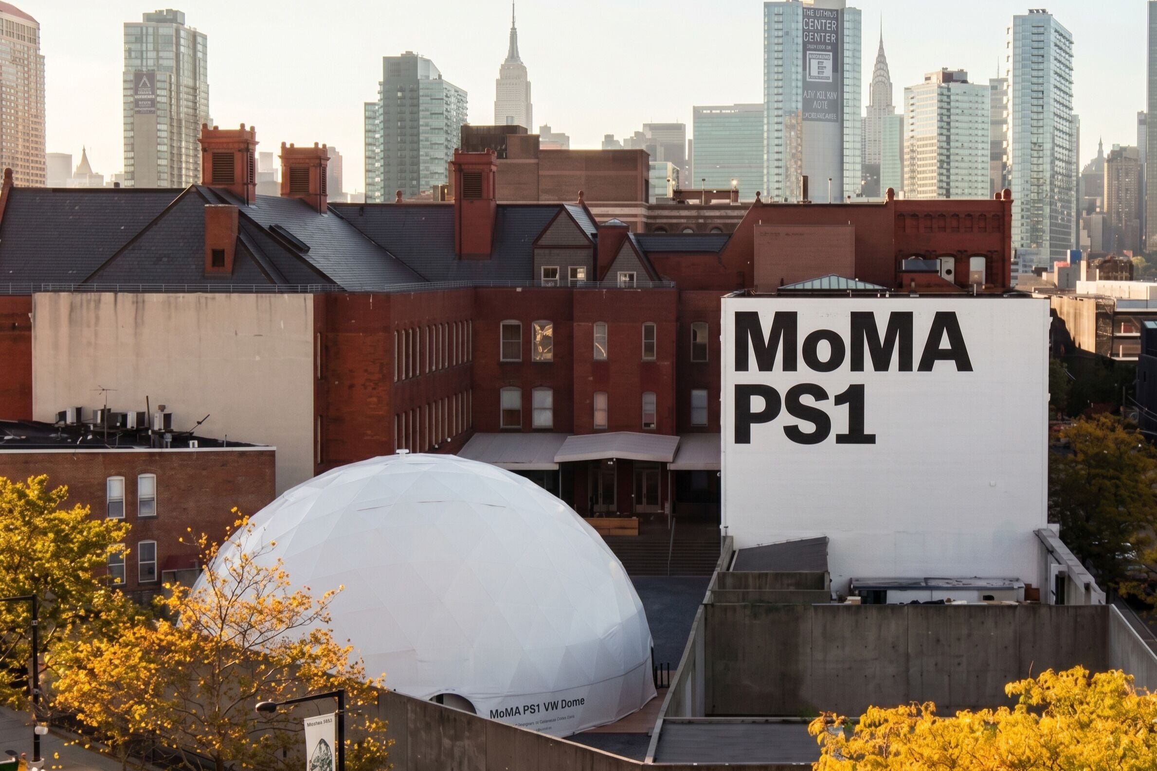 A cityscape with a large white dome structure labeled 'MoMA PS1' and a prominent building with the same name.