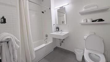 Designer toiletries, hair dryer, towels, soap