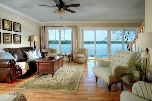 Living room with beautiful views of Owasco Lake