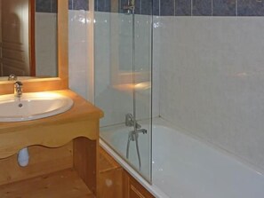 A bathroom with a wooden vanity, a sink, and a glass-enclosed shower area. - Ski-in/ski-out & foot of the slopes, view ski slopes, swimming pool, sauna, balcony, tv, 36m² (Les Orres)