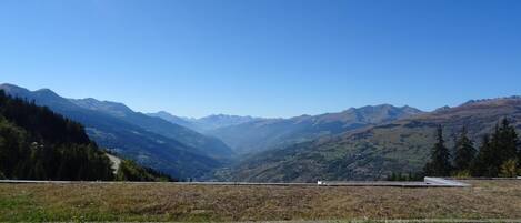 A mountainous landscape with a clear sky.