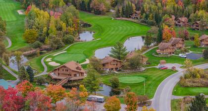 Deck with views! 2 bed 2 bath sleeps 6-8, pool,close to Torch Lake, Boat parking