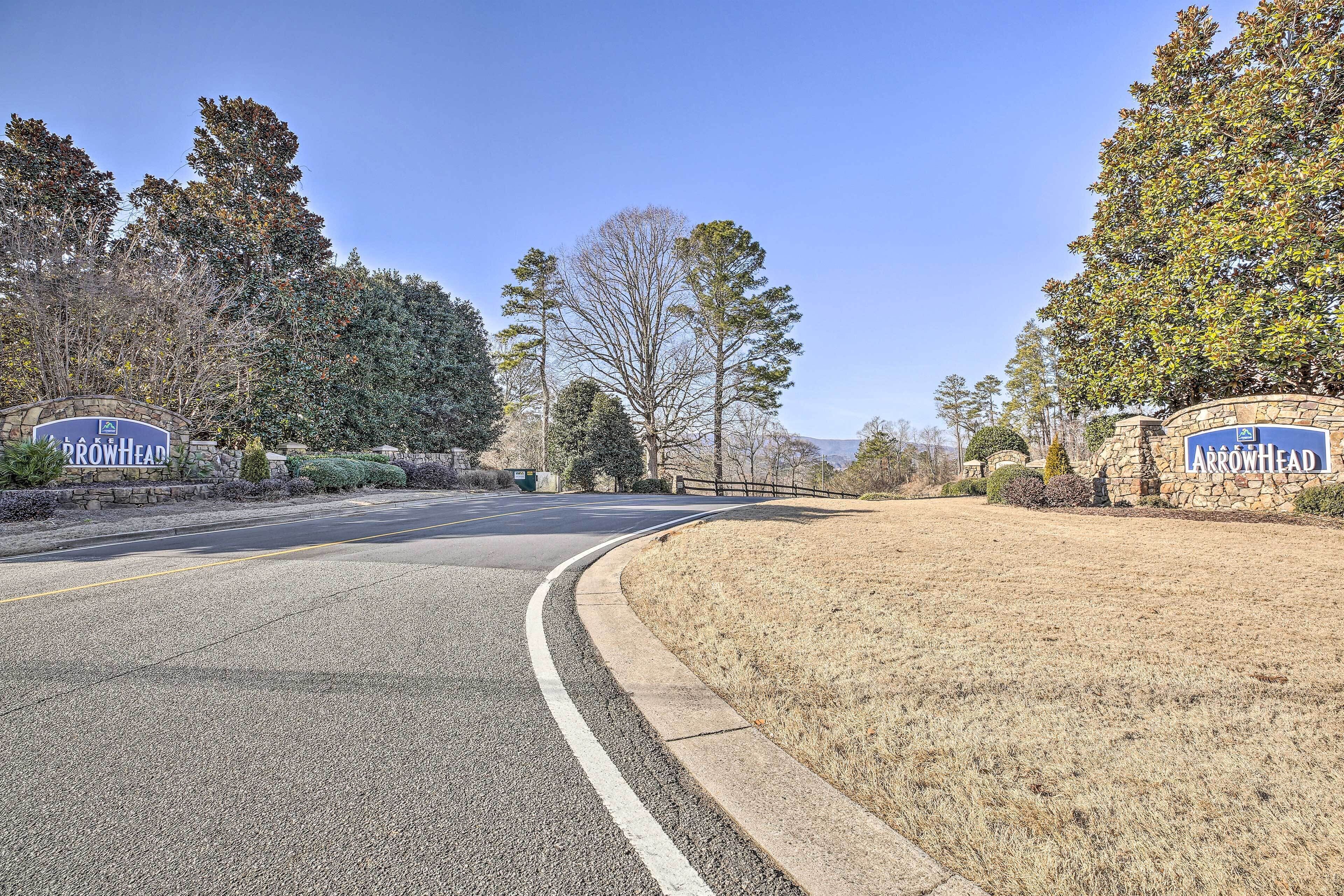 A road curving to the right with a sign reading "Arrowhead."