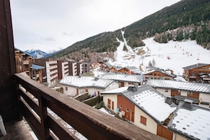 Surrounded by snow-capped mountains, this charming town offers a serene winter wonderland experience.