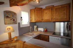 Fridge, microwave, dishwasher, coffee/tea maker