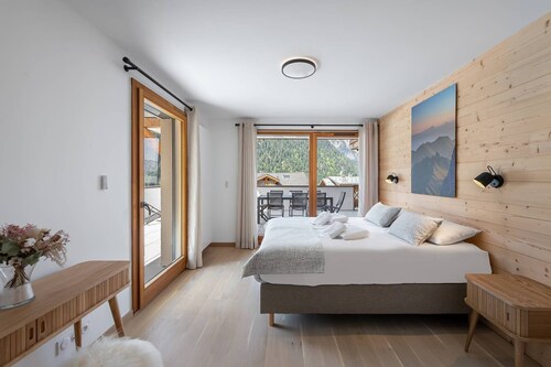 Proche du centre, appartement neuf avec 4 chambres et 3 salles de bains