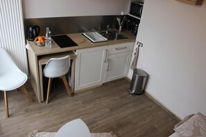 Fridge, microwave, coffee/tea maker, toaster