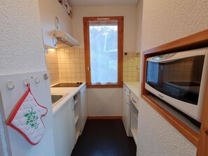 Fridge, microwave, coffee/tea maker, toaster