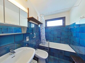 Bathtub, hair dryer