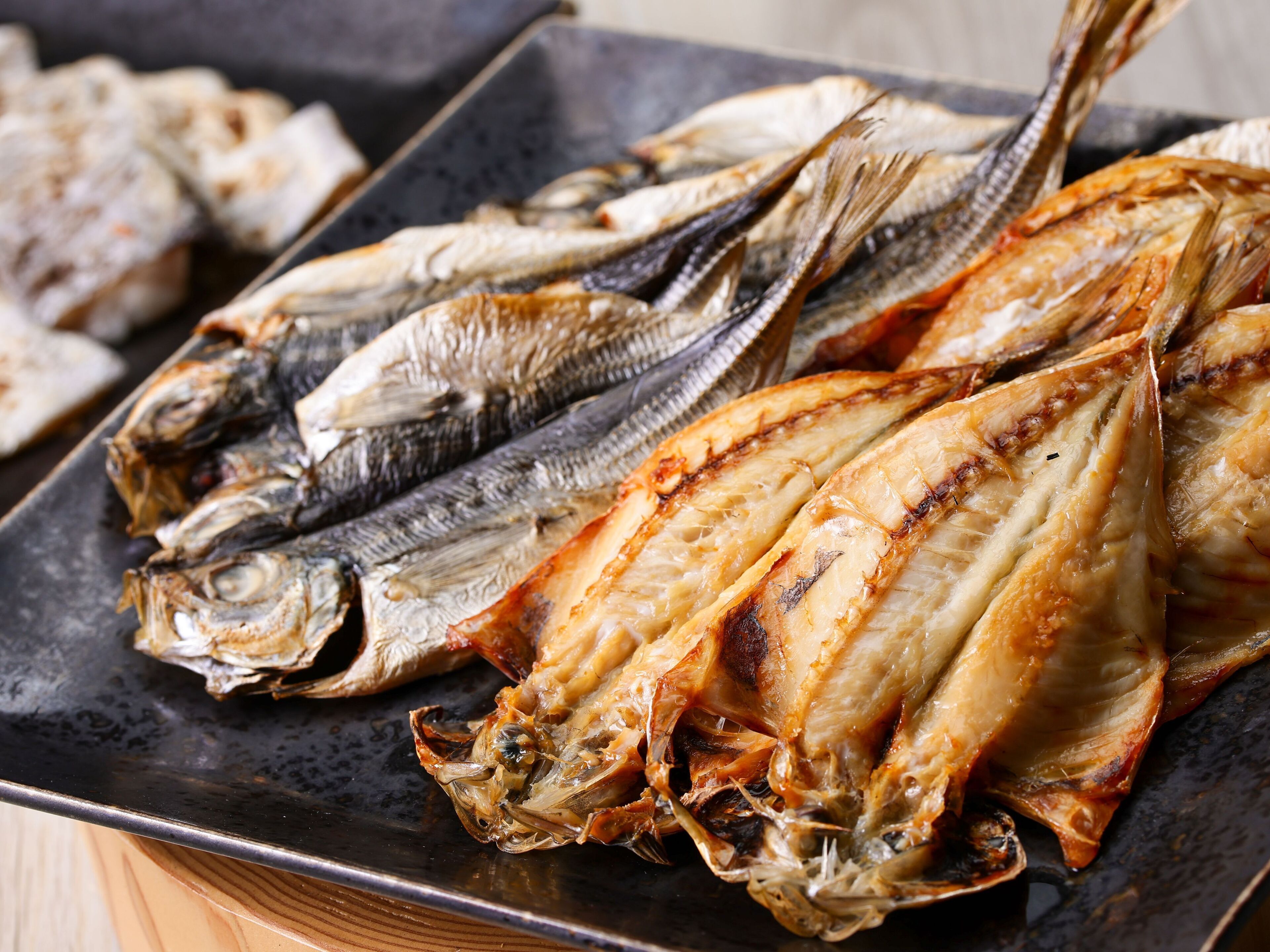 A tray of grilled fish.