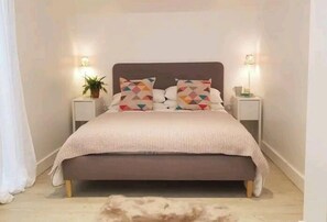 1 غرفة نوم ومكواة/لوح كي وواي فاي وملاءات أسرّة