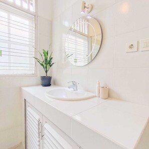 Shower, hair dryer, towels, soap