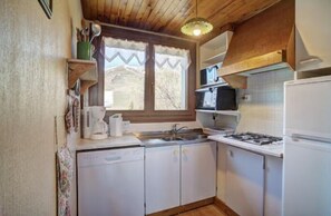 Enjoy cooking in this kitchen with appliances and ample natural light.