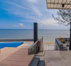 Enjoy breathtaking views of the sea from this expansive outdoor space.