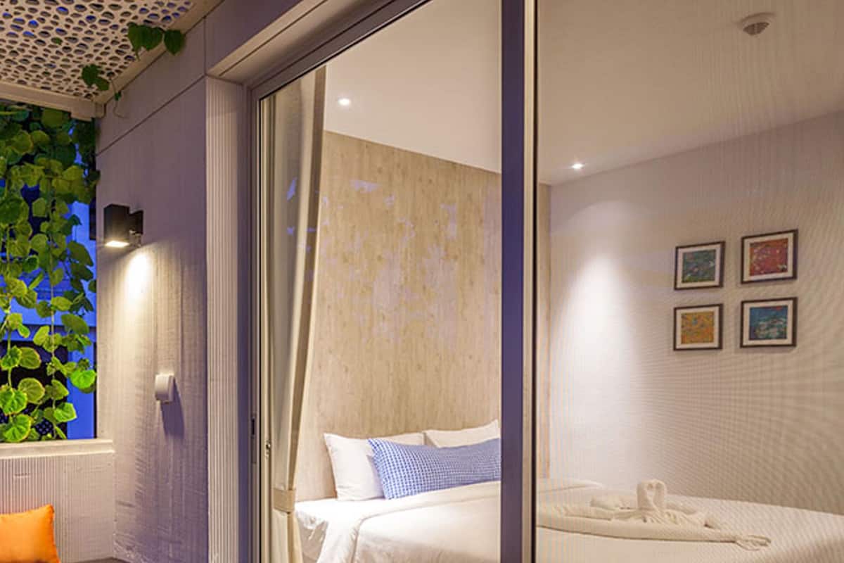 Deluxe Double Room, 1 King Bed | 2 bedrooms, in-room safe, individually decorated, individually furnished