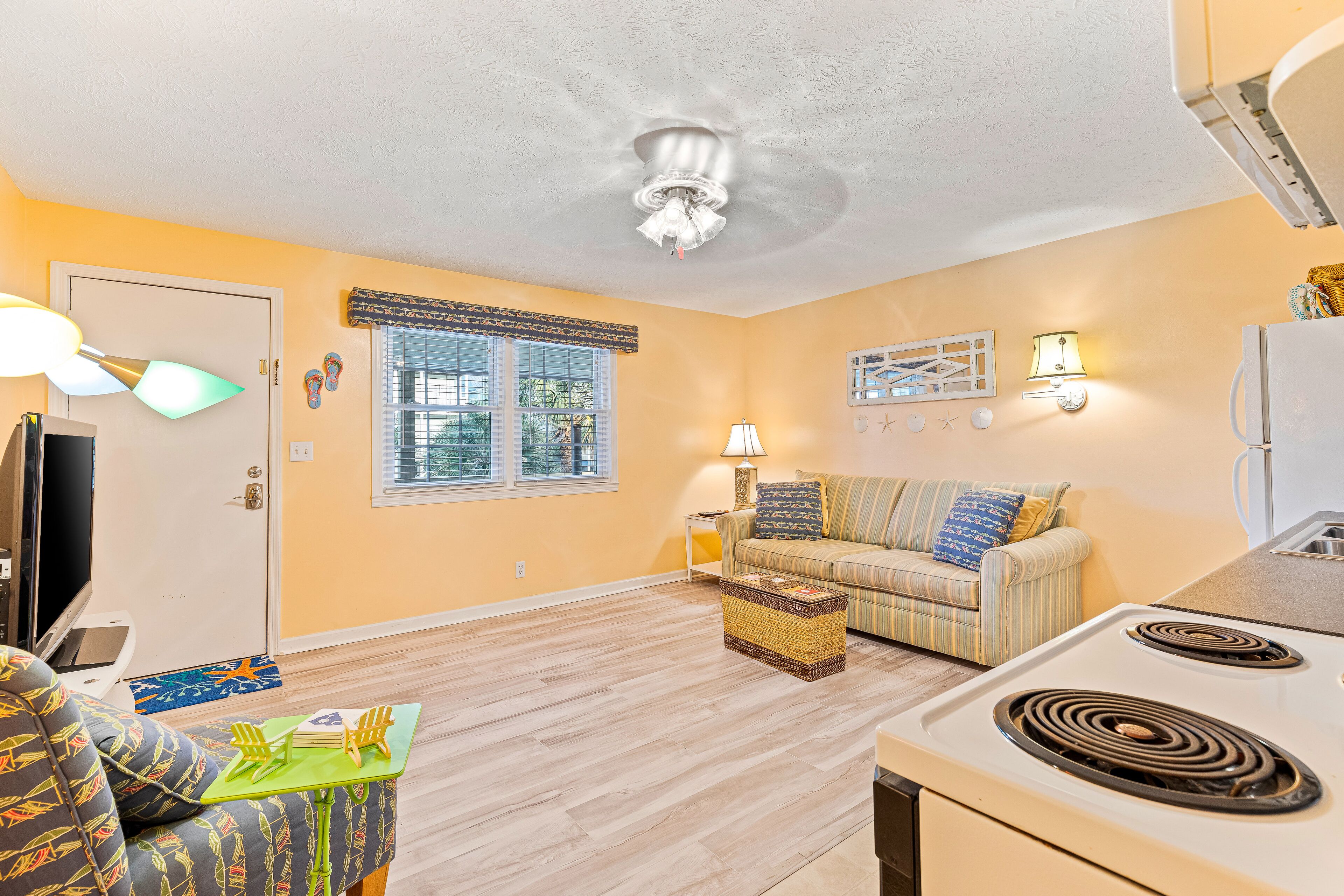 Charming Beach Gem with Shared Pool, Beach Gear, Partial AC, and Walkable Locale