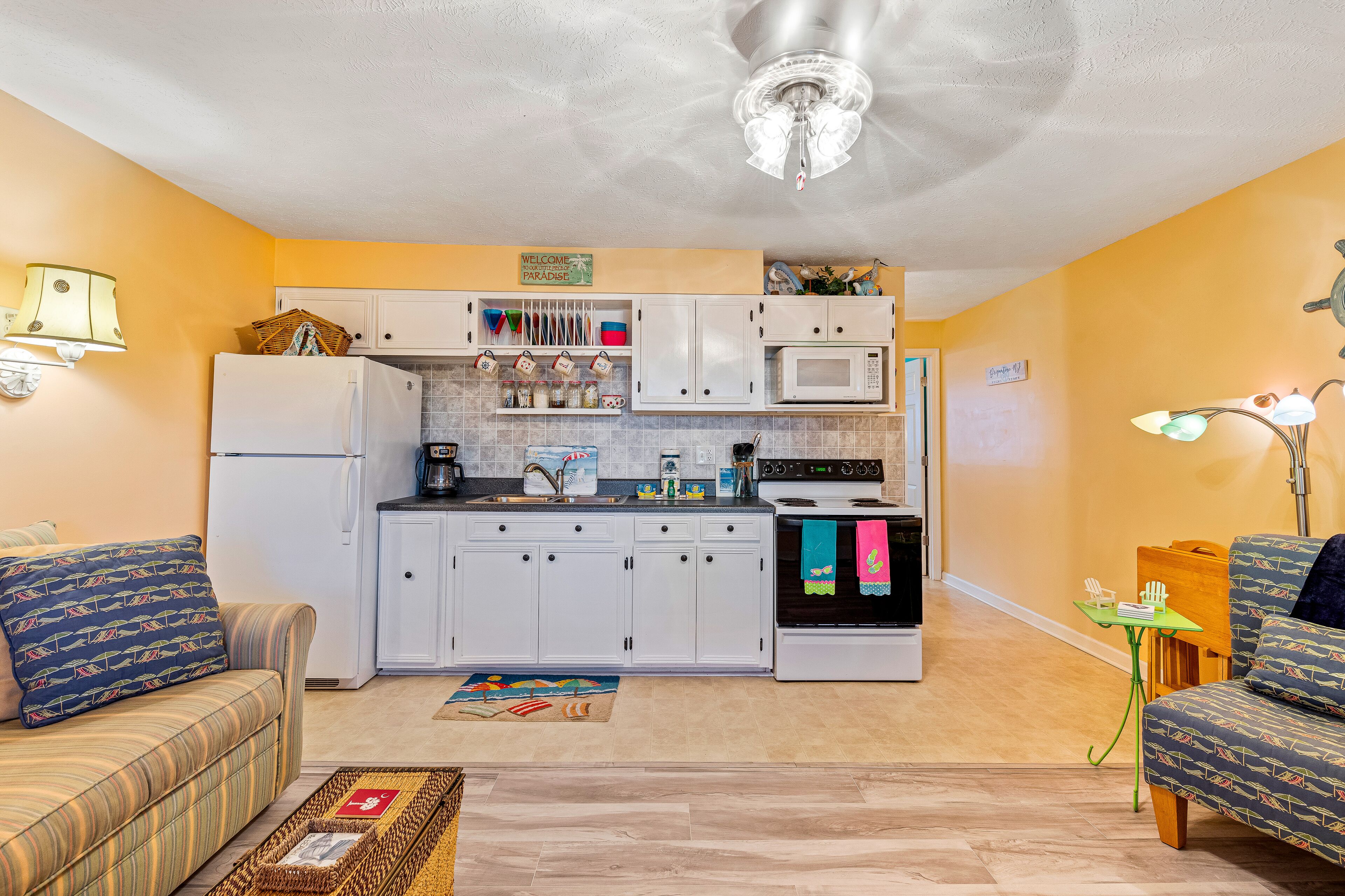 Charming Beach Gem with Shared Pool, Beach Gear, Partial AC, and Walkable Locale