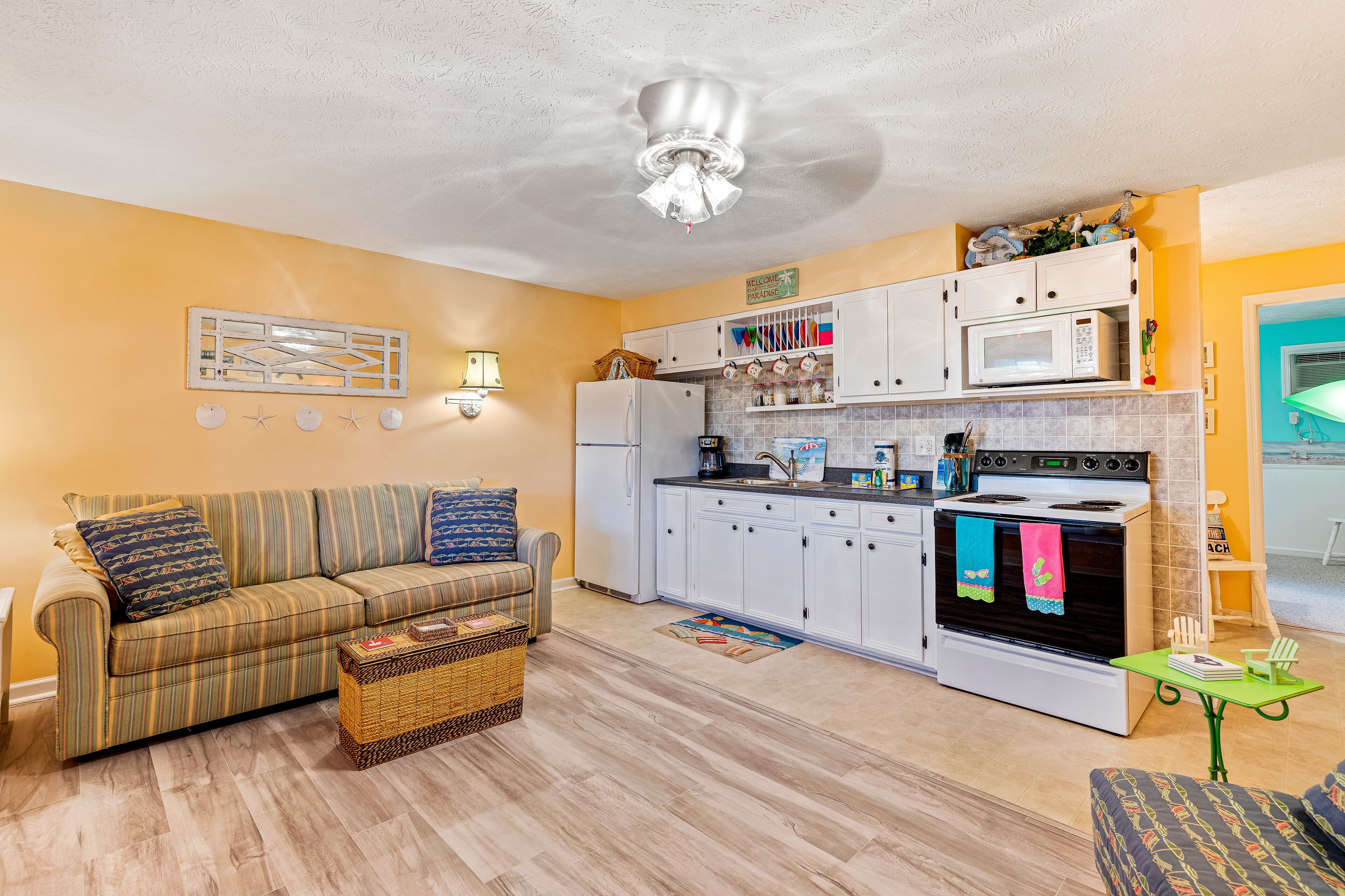 Charming Beach Gem with Shared Pool, Beach Gear, Partial AC, and Walkable Locale