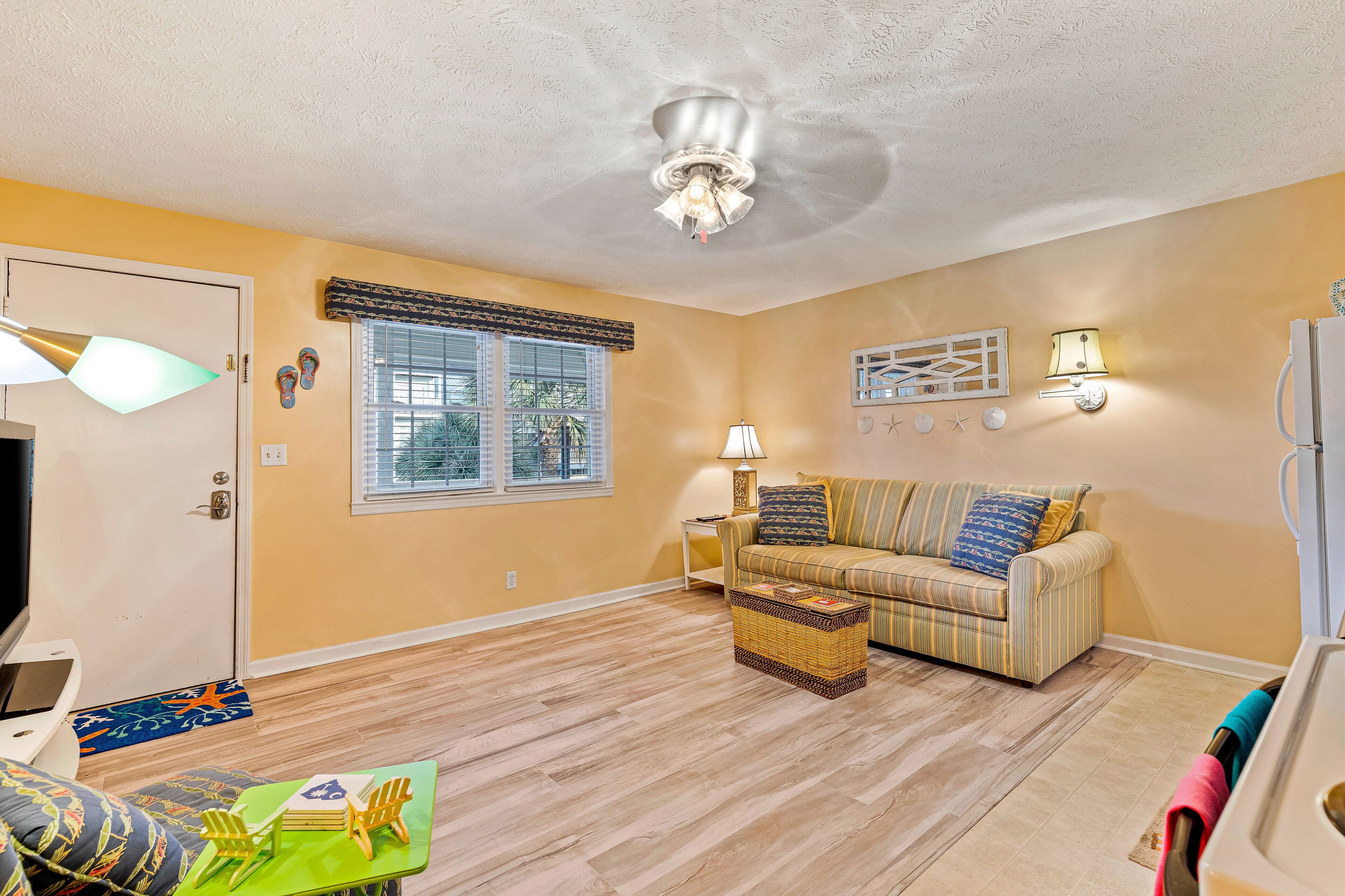 Charming Beach Gem with Shared Pool, Beach Gear, Partial AC, and Walkable Locale