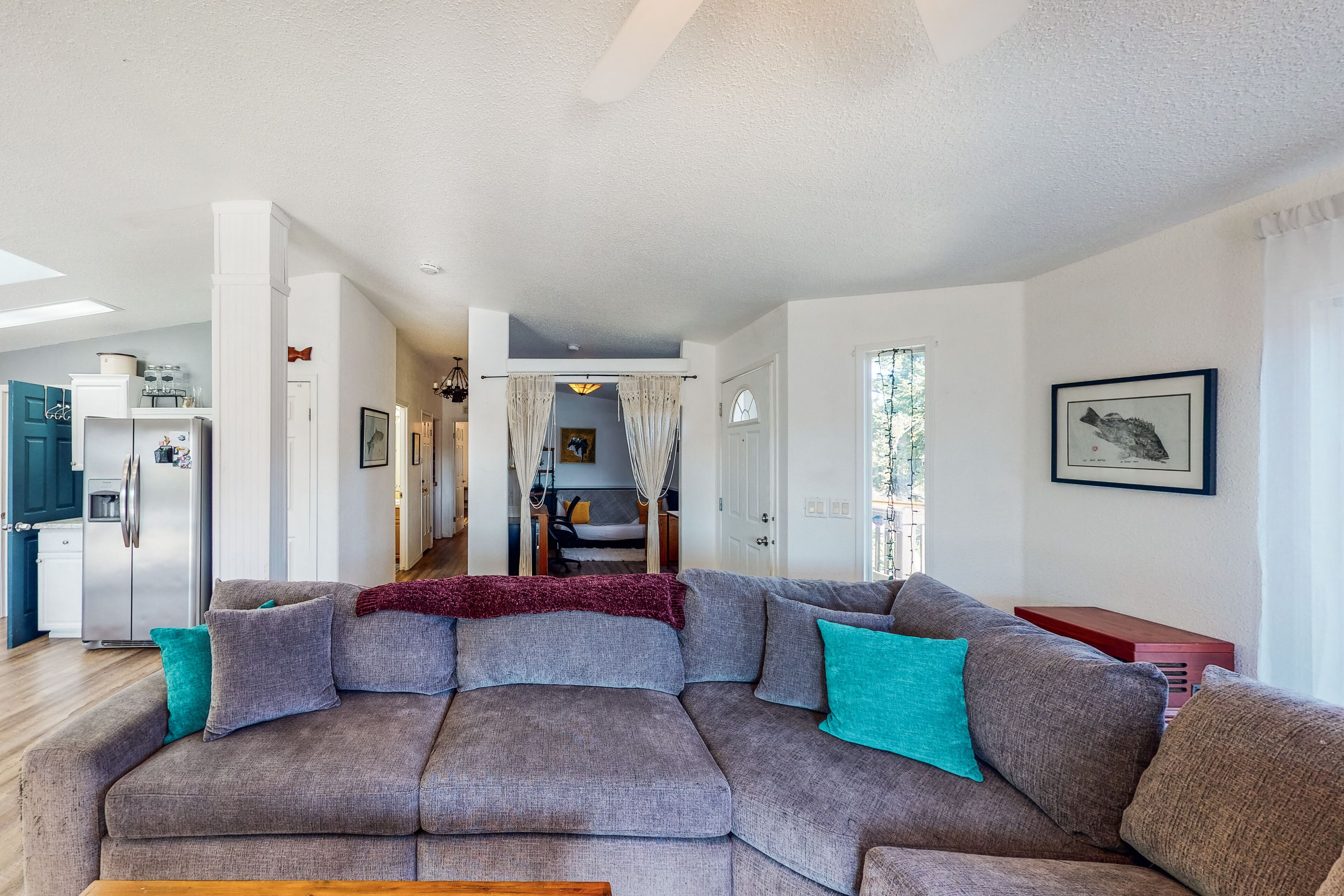 Serene waterfront haven with lake views, fenced yard & home office