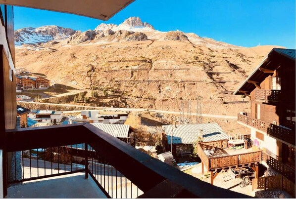 Enjoy breathtaking views of the surrounding mountains and serene body of water from the comfort of your balcony.