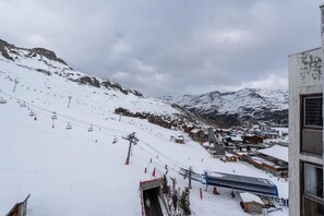 Experience the thrill of skiing and breathtaking mountain views from this picturesque ski resort.