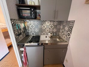 Fridge, microwave, coffee/tea maker, toaster