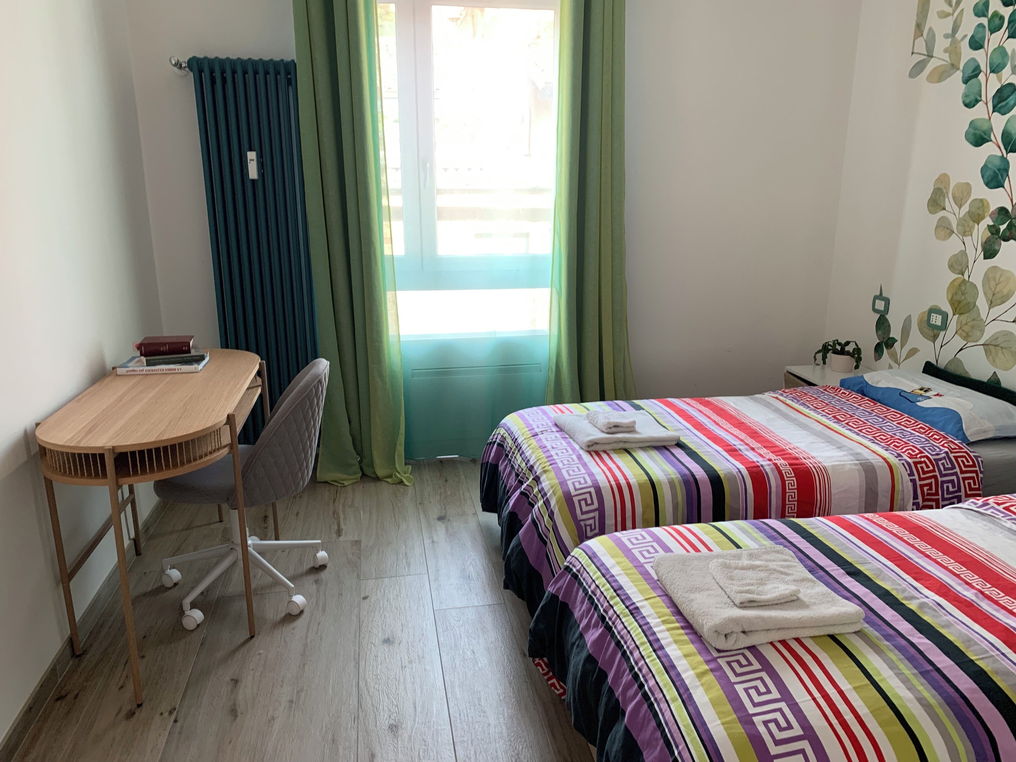 2 slaapkamers, een strijkplank/strijkijzer, wifi, beddengoed