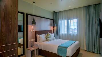 Premium Suite, 3 Bedrooms | Hypo-allergenic bedding, in-room safe, individually furnished, desk