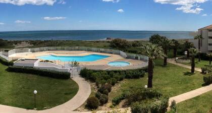 Seaside Apartment with Pool, Parking, and Pets Allowed