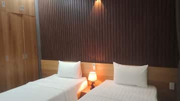 3 bedrooms, blackout curtains, soundproofing, iron/ironing board