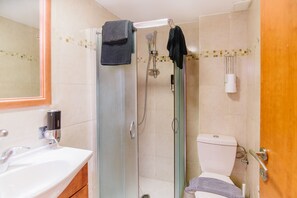 Hair dryer, towels, shampoo