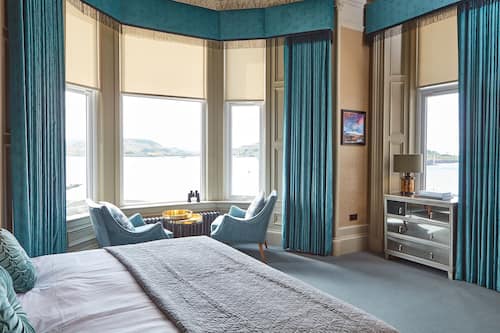 Habitación doble superior, 1 cama King size, vista al océano, frente al mar | Ropa de cama de alta calidad y caja de seguridad en la habitación