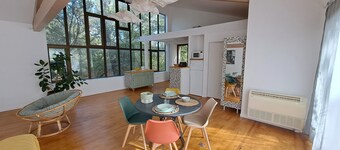 Bright loft-style apartment in the woods