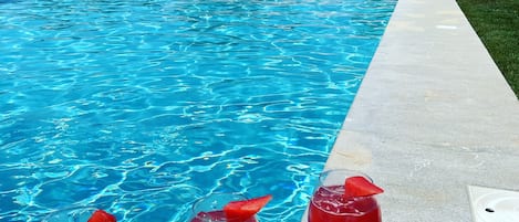 Seasonal outdoor pool, pool umbrellas, sun loungers