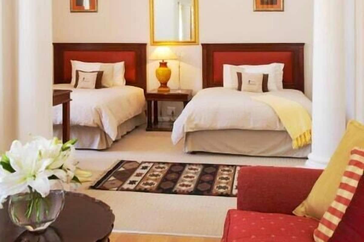 Deluxe-Zimmer, 2 Doppelbetten, Bergblick | Wohnbereich