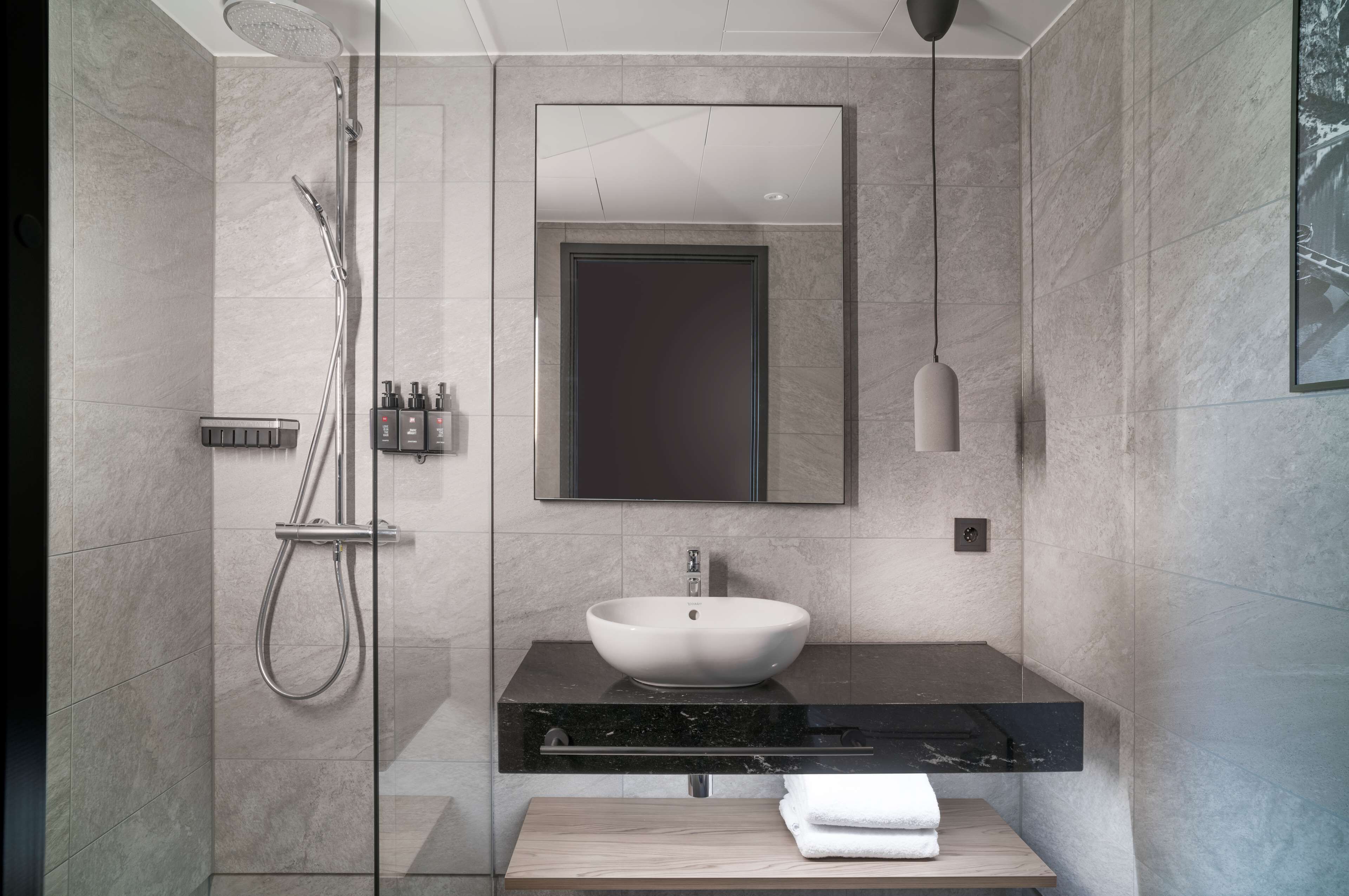 shower, free toiletries, hair dryer, towels