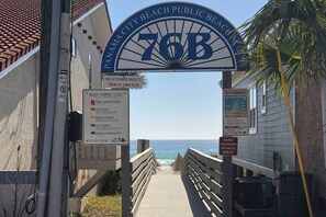 A beach entrance sign with 'Panama City Beach Public Beach' and '76B' on it. - Renovated PCB Studio, 2 Min Walk To Laguna Beach! (Panama City Beach)